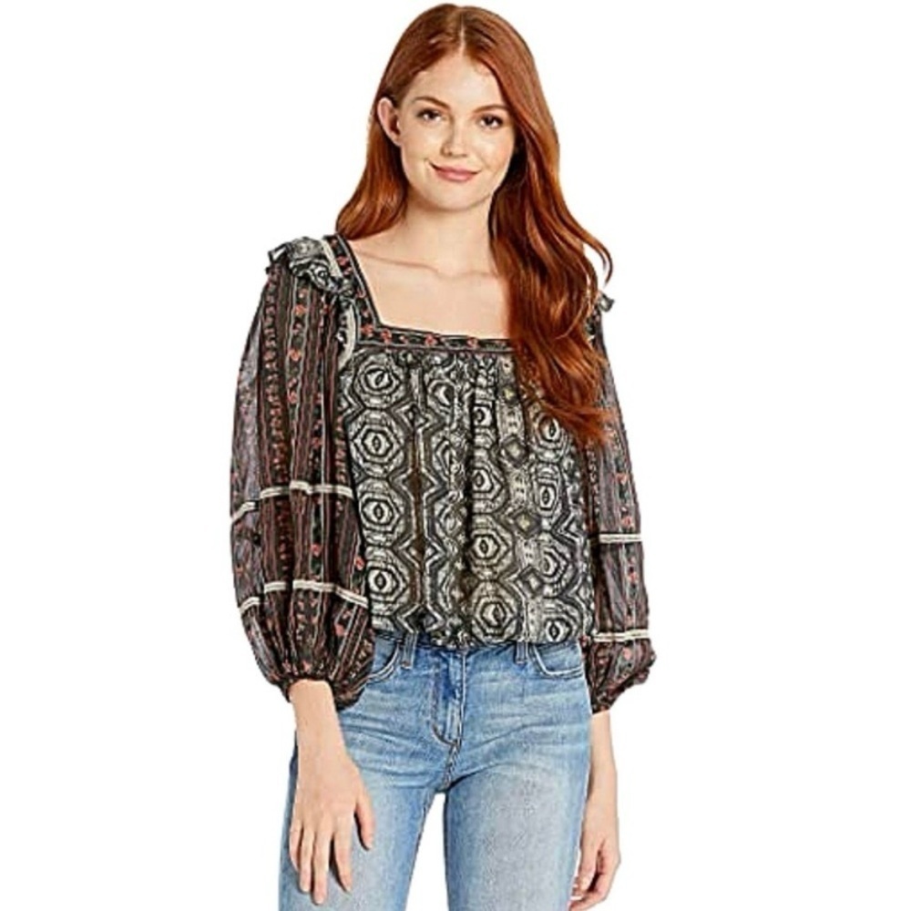 Free People mixed print peasant blouse in black. Size M
